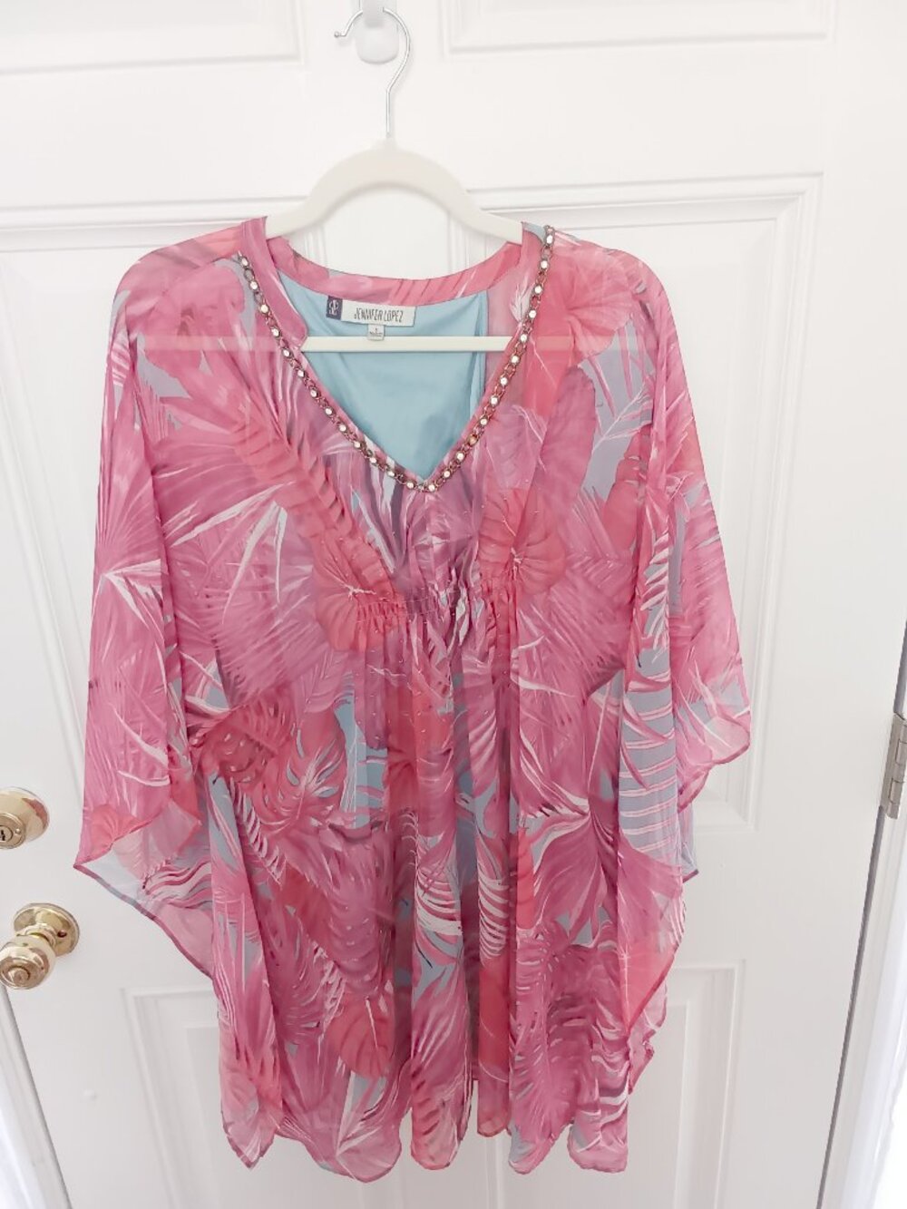 A Jennifer Lopez pink, blue, floral, palm Size Small blouse w/ jeweled neckline